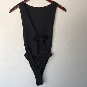 Prettylittlething black high neck bow body suit
